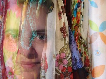 Double exposure of woman and scarves