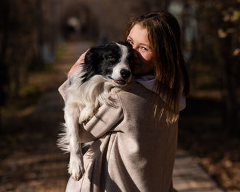 Portrait of woman with dog