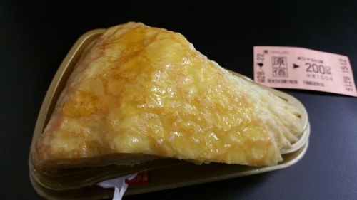 Close-up of bread against black background