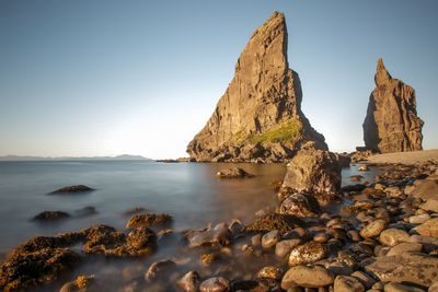 Scenic view of sea against clear sky