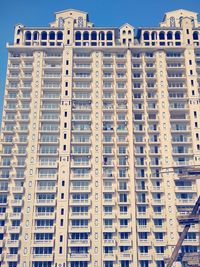 Low angle view of buildings against clear sky