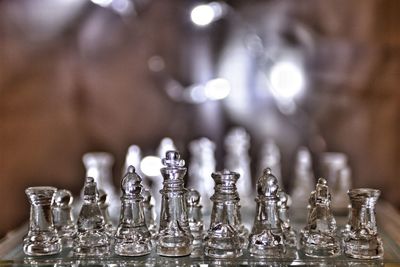 Close-up of chess pieces on table