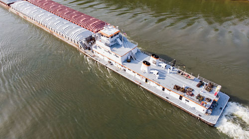 High angle view of people on boat in river