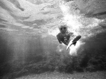 Man swimming in sea