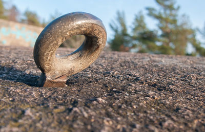 Close-up of rusty metal on land