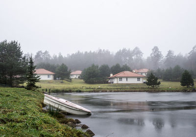 Boat by frozen lake