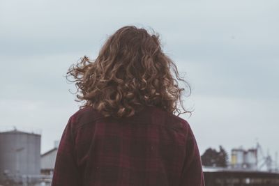 Close-up of young woman looking away
