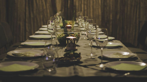 Close-up of glasses on dining table