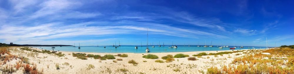 View of beach against blue sky