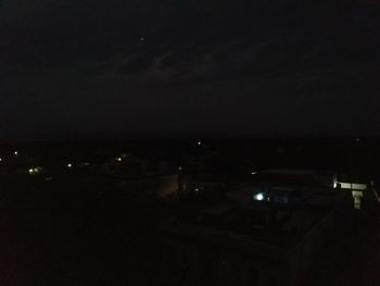 Illuminated buildings in city at night