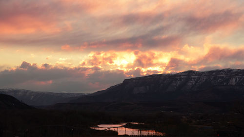 Scenic view of dramatic sky during sunset