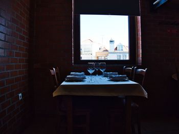 Chairs and table against wall at home