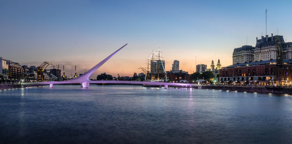 Illuminated city at waterfront