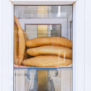 Close-up of bread on glass window