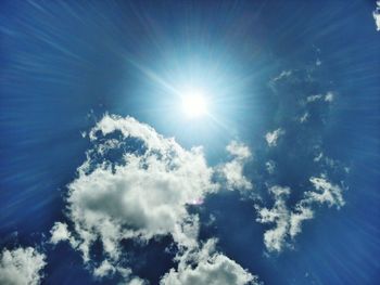 Sun shining through clouds