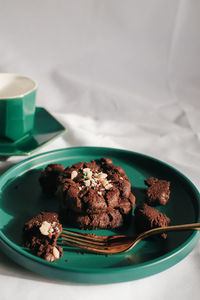 Brownie with fork in plate