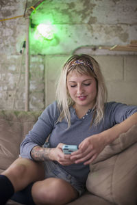Portrait of a young woman on her cell phone.