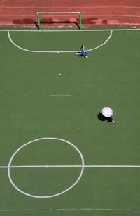 High angle view of soccer ball on field