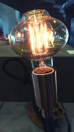 Close-up of illuminated light bulb