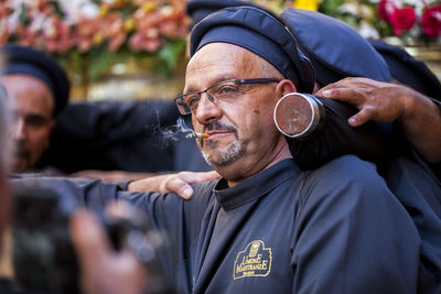 Close-up of man wearing eyeglasses