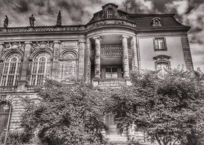 View of building against cloudy sky