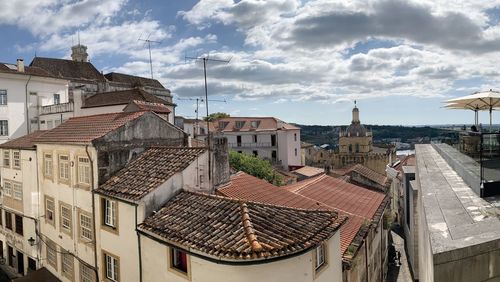 High angle view of buildings in city against sky