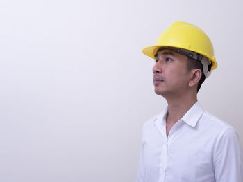 Portrait of young man looking away