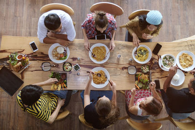 High angle view of people at dining table