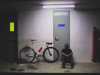 Bicycle parked in illuminated room