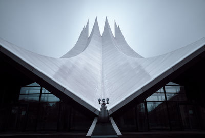 Architectural column against sky