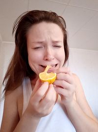 Portrait of woman holding ice cream