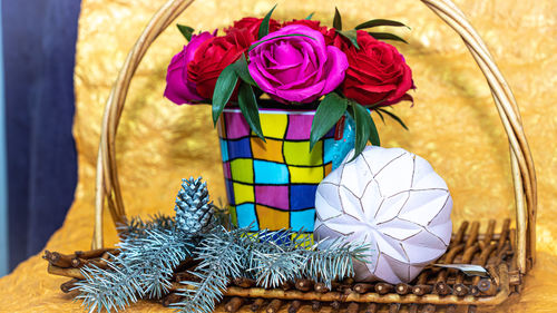 Close-up of multi colored flowers on table