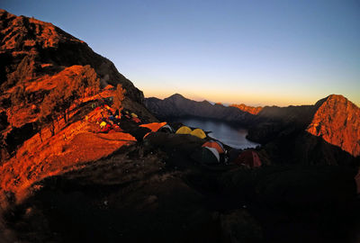 Scenic view of mountains against sky during sunset