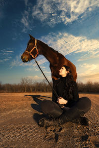 Woman sitting on a field