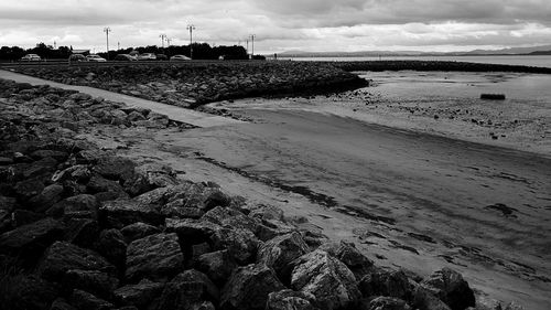 Scenic view of sea against cloudy sky