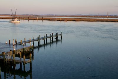 Pier on sea against sky