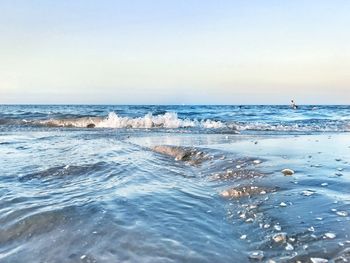 Scenic view of sea against clear sky