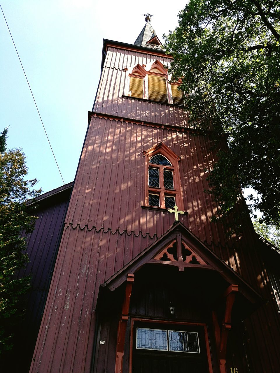 LOW ANGLE VIEW OF CHURCH TOWER AGAINST SKY