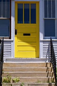 Yellow door of building