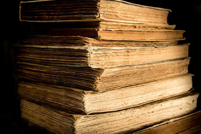 Close-up of old stack of books