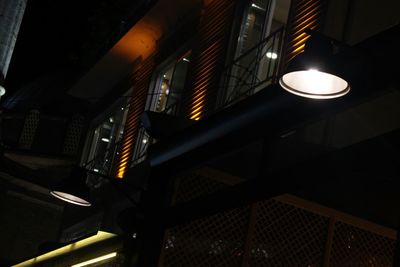 Low angle view of illuminated building at night