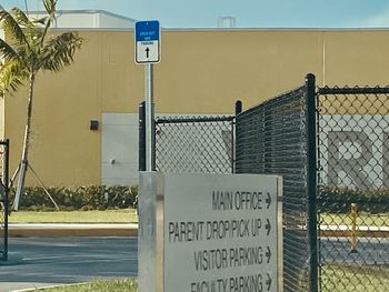 Information sign on fence