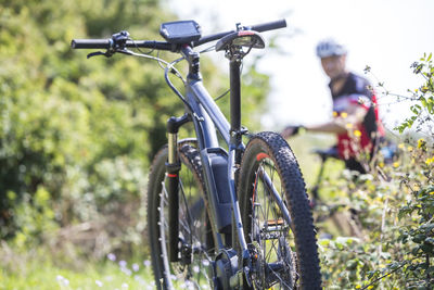 Bicycle parked on field