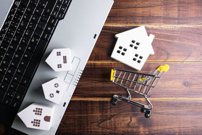 Directly above shot of shopping cart on laptop