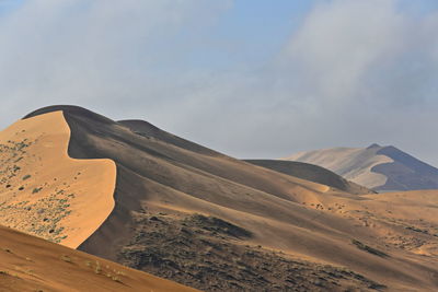 Scenic view of desert against sky