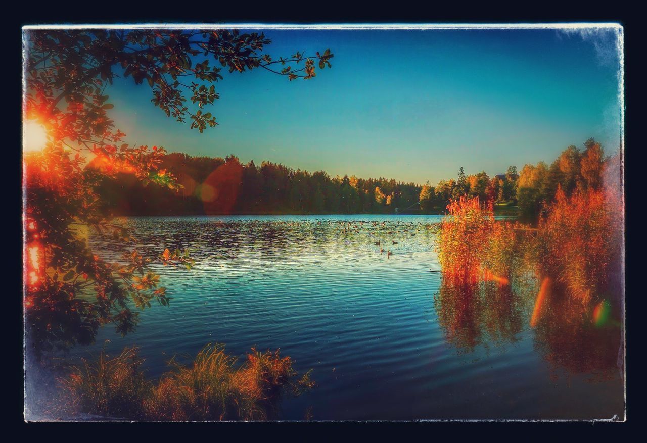 SUNSET OVER LAKE