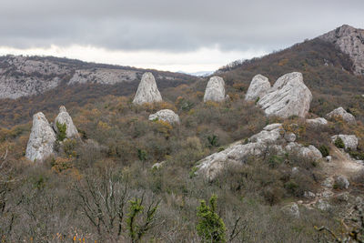 Scenic view of rocky mountains against sky