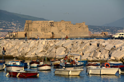 Panoramic view of sea and mountains against sky