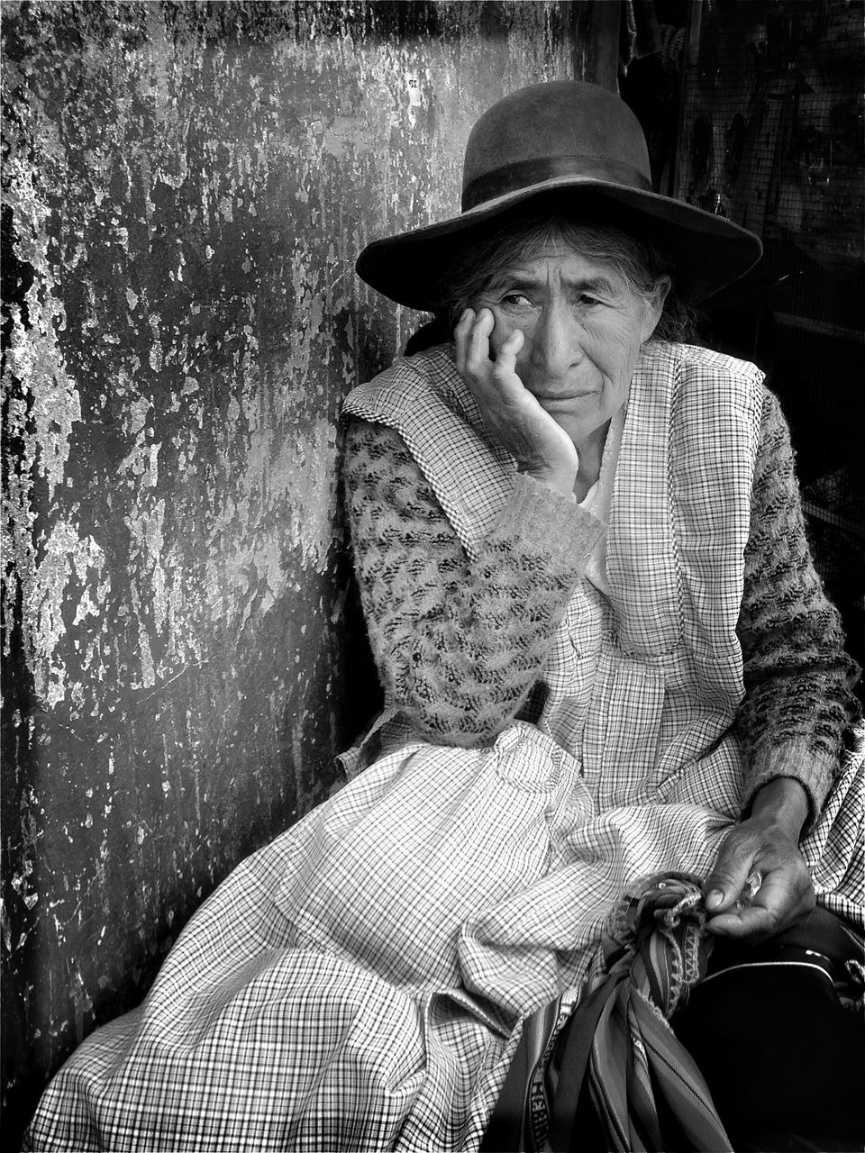 hat, front view, sitting, one person, looking at camera, outdoors, real people, portrait, day, women, lifestyles, happiness, smiling, young women, one woman only, adult, young adult, adults only, people