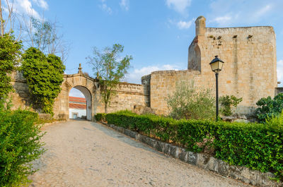 Entrance of historic building against sky